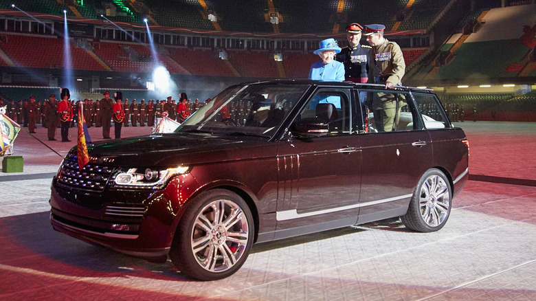 Queen Elizabeth II with State Review Range Rover