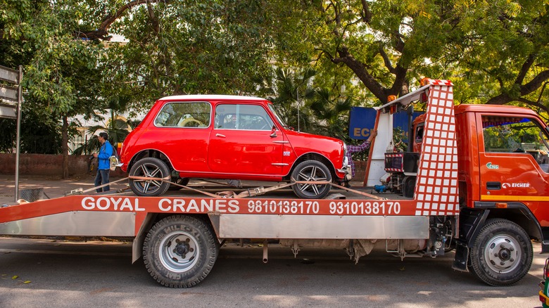 Classic Mini Cooper being towed