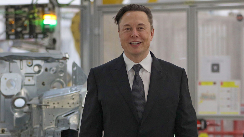 Elon Musk at a factory.