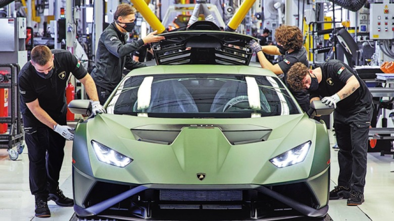 Lamborghini employees on the production line
