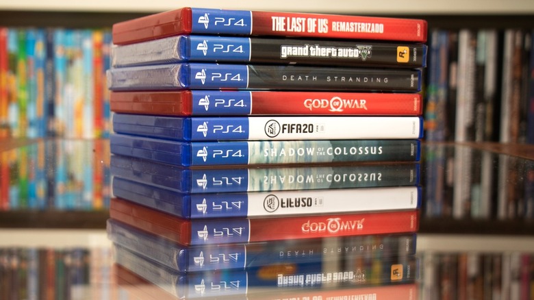 A stack of Sony games