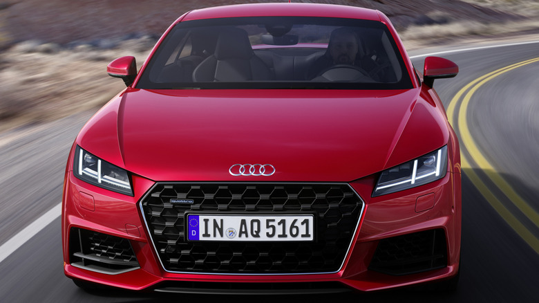 A red Audi seen head-on