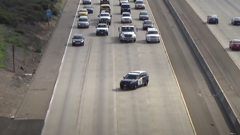 California Highway Patrol performing a traffic break on Interstate 805 northbound in San Diego, California.