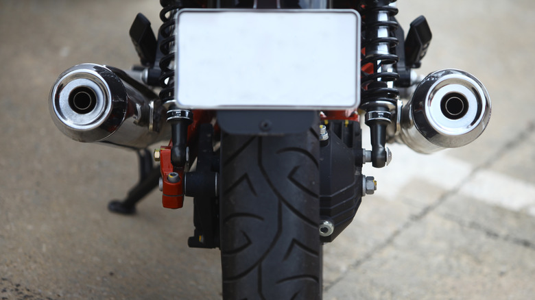 A motorcycle rear with a blank license plate