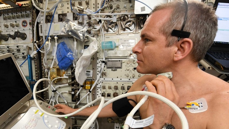 Canadian Space Agency astronaut performing ultrasound