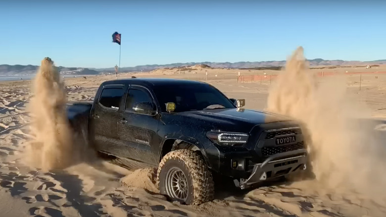 Toyota Tundra using crawl control at beach