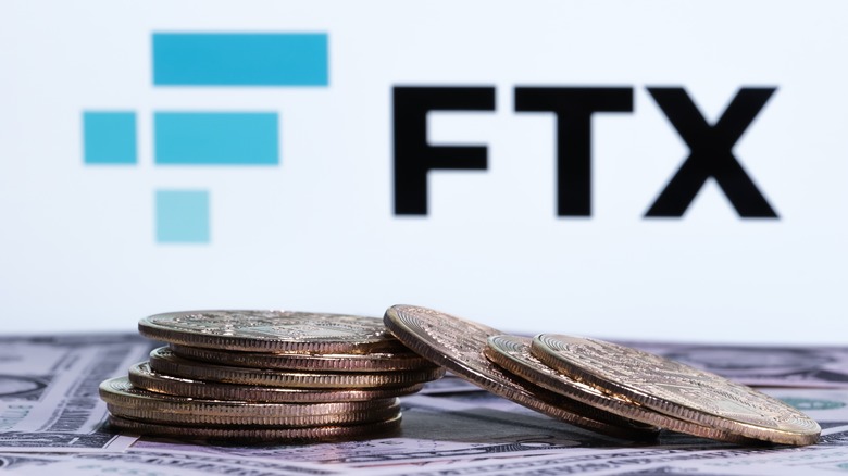 FTX logo with piles of coins