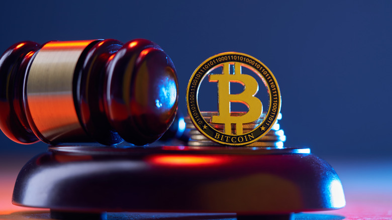 Bitcoin logo with a judge's gavel