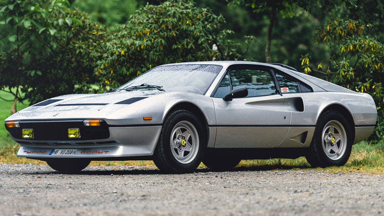 A silver-colored Ferrari 208GTB