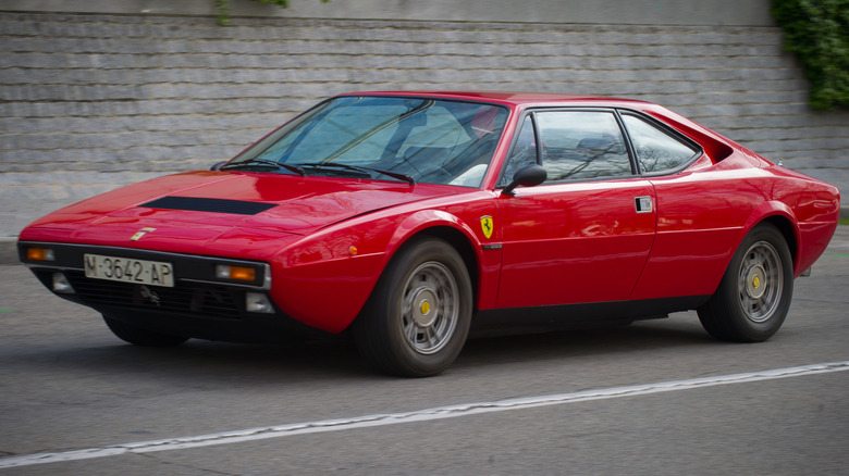 A red Ferrari Dino 208 GT4