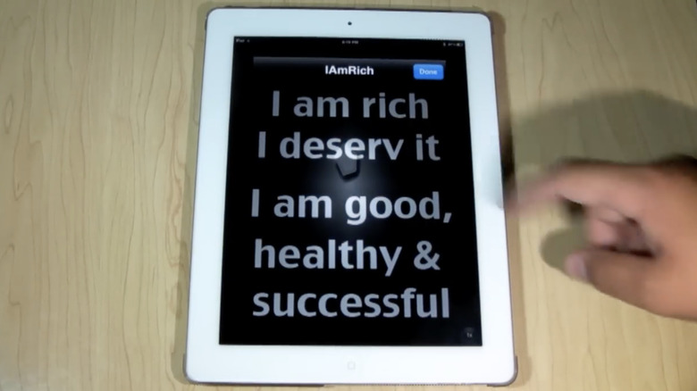 video still of I Am Rich app in use