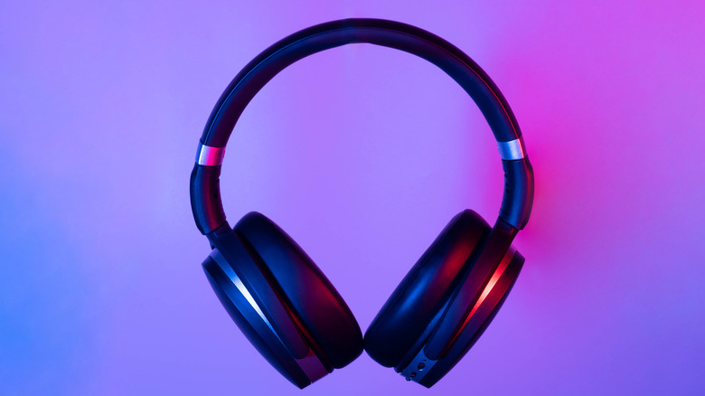 wireless headphones purple background