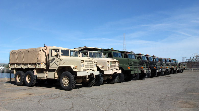 row of military trucks