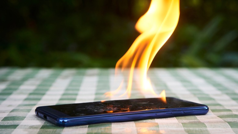 iPhone on fire on a table