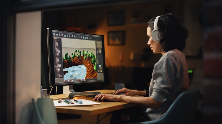 woman working on computer at desk