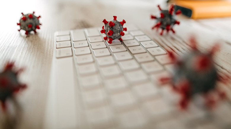 Graphics of microorganisms on desk keyboard