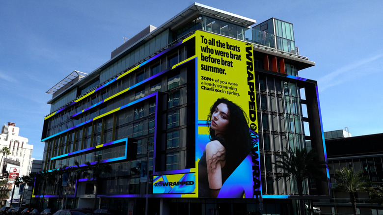 A Spotify billboard featuring Charli XCX