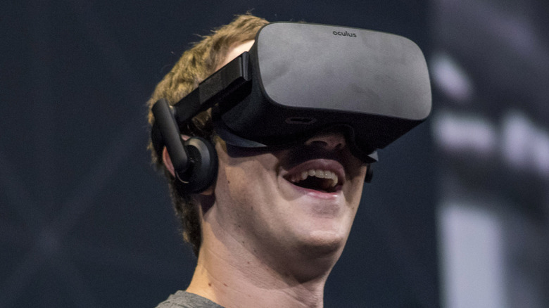 Mark Zuckerberg demonstrates an Oculus Rift