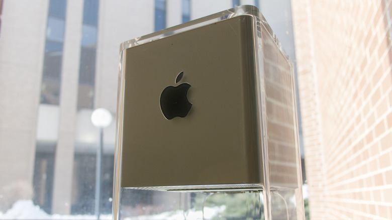 The PowerMac G4 Cube next to a window