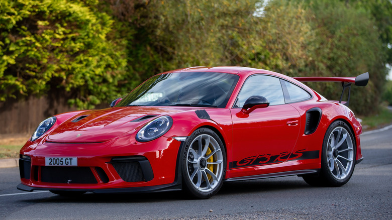 A red pre-2018 Porsche 911 Turbo S