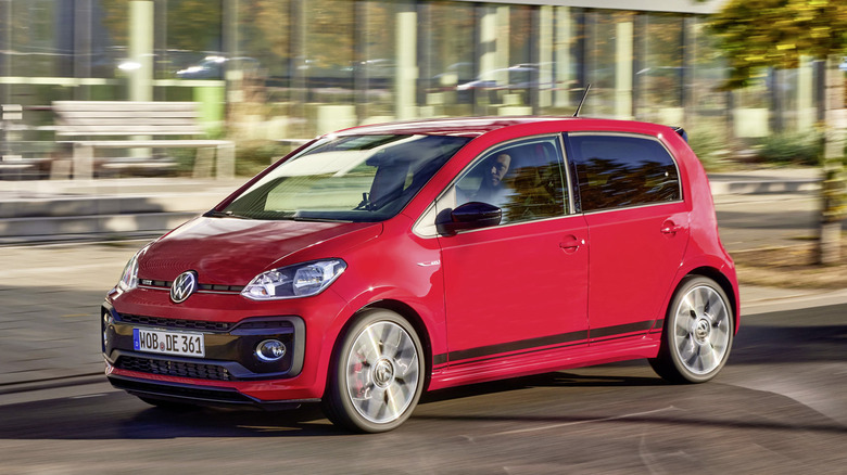 Red Volkswagen Up GTI on the road