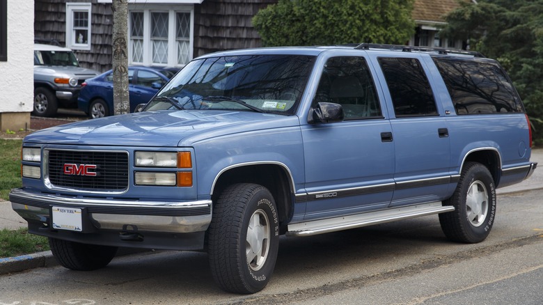 1995 GMC Suburban parked on street