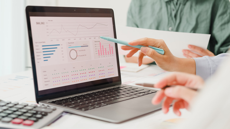 financial data on laptop screen