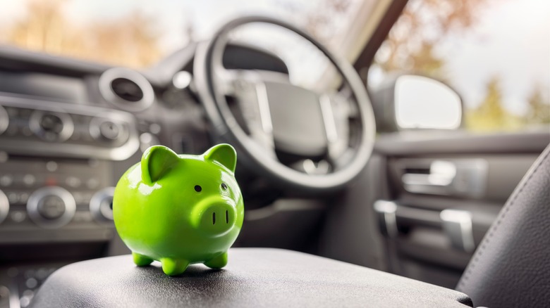 "Piggy bank" money box in a car