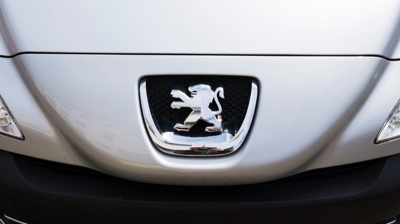 Peugeot logo on car hood