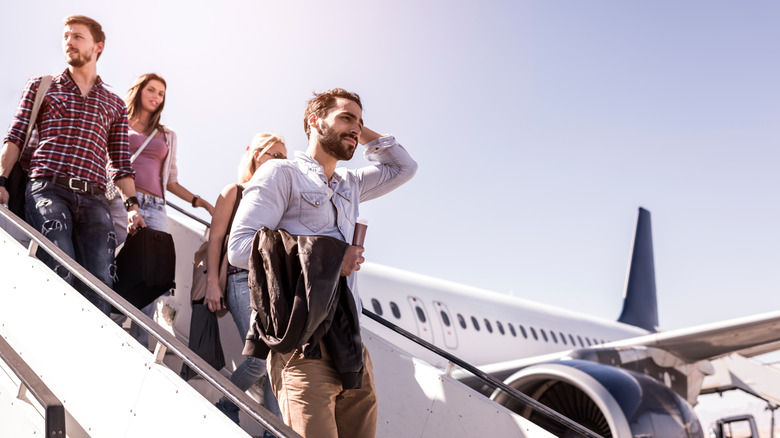 people going down plane