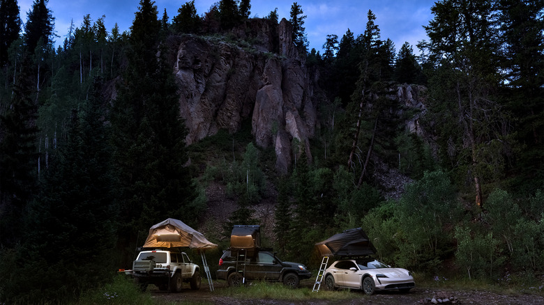 Overlanding vehicles parked at night