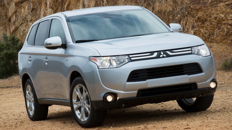 2014 Mitsubishi Outlander Parked On A Dirt Road In The Mountains