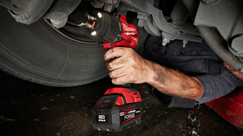 Milwaukee impact  wrench being used on automotive fasteners