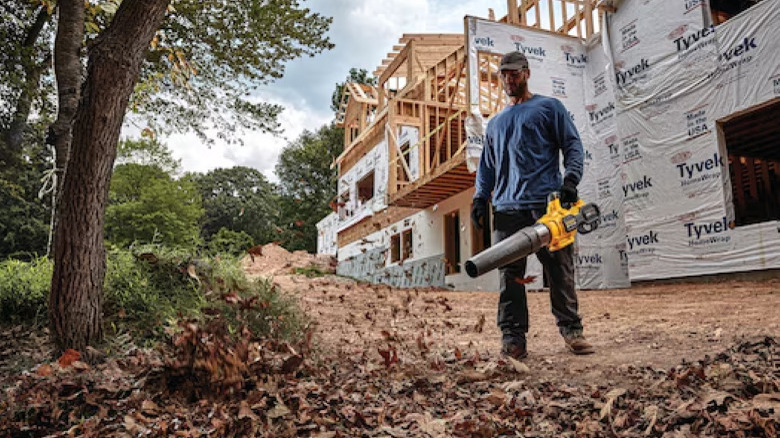 Person using Dewalt leaf blower