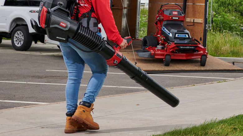 Person using Toro leaf blower