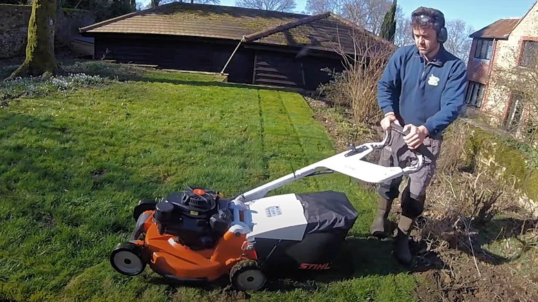 Man mowing with Stihl RM 756 YC