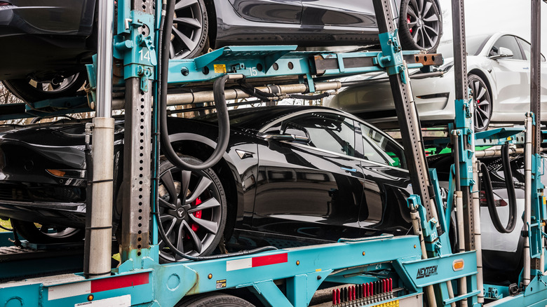 tesla cars packed for transport