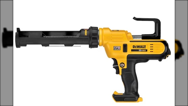 DeWalt cordless caulking gun isolated on a white background.