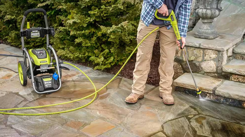 Man powerwashing