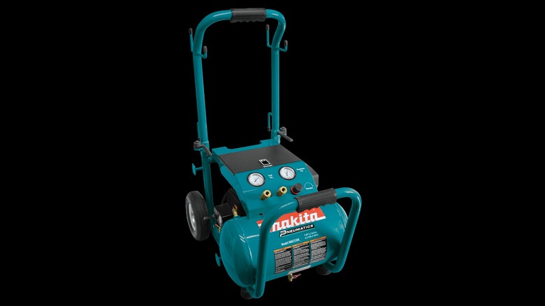 blue Makita air compressor on dolly