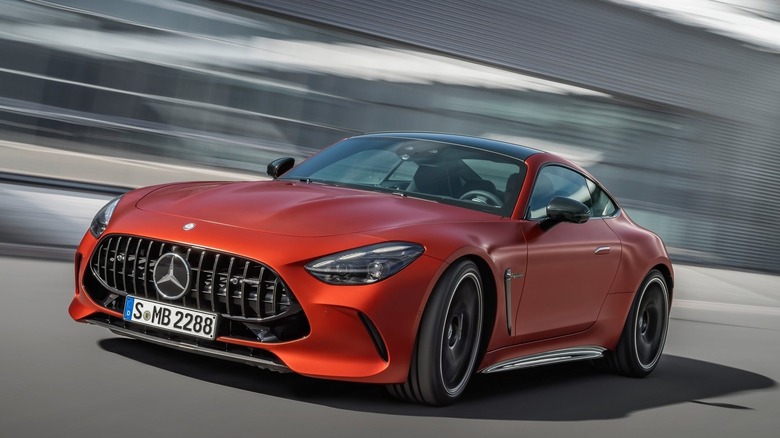 The Mercedes-AMG GT 63 E Performance in orange, front 3/4 view