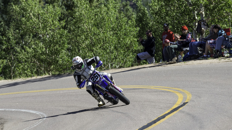 Man riding Yamaha YZ250 motorcycle