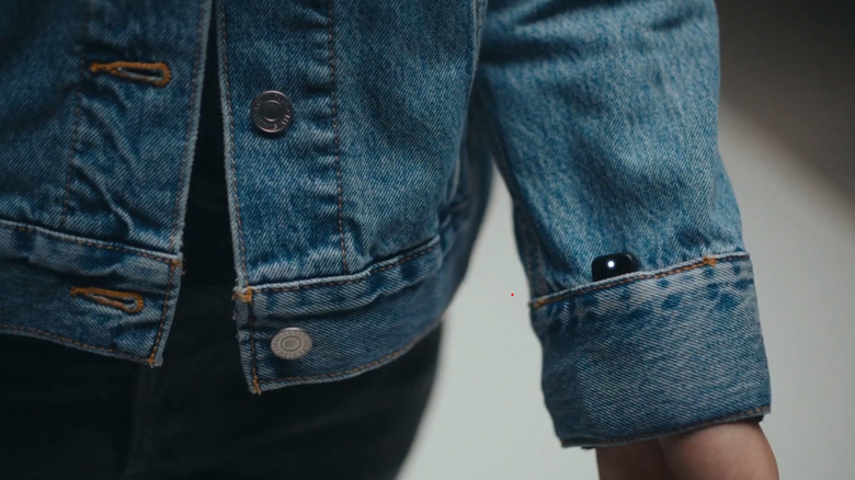 Person interacting with Google Project Jacquard Levi's jacket.