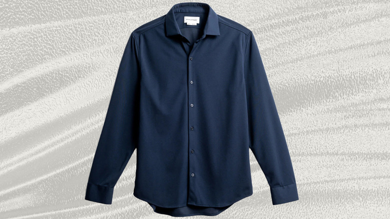 Front view of a blue Apollo shirt made by Ministry of Supply.