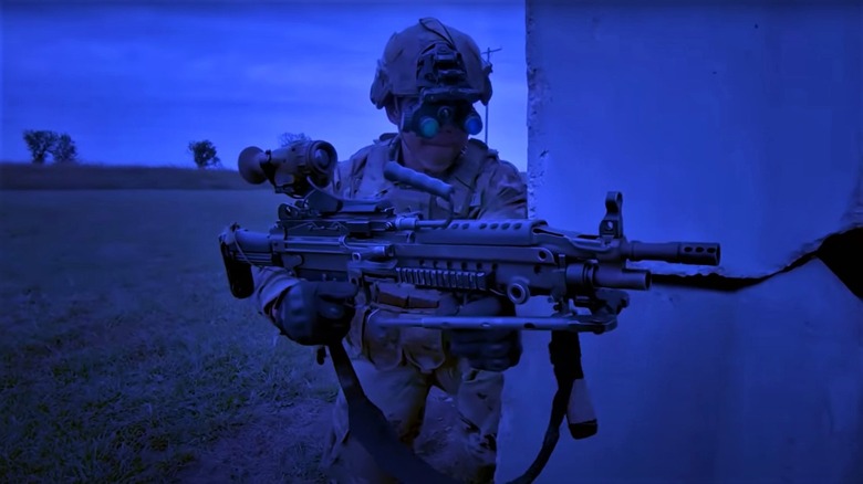 Soldier shooting from cover using ENVG-B optics