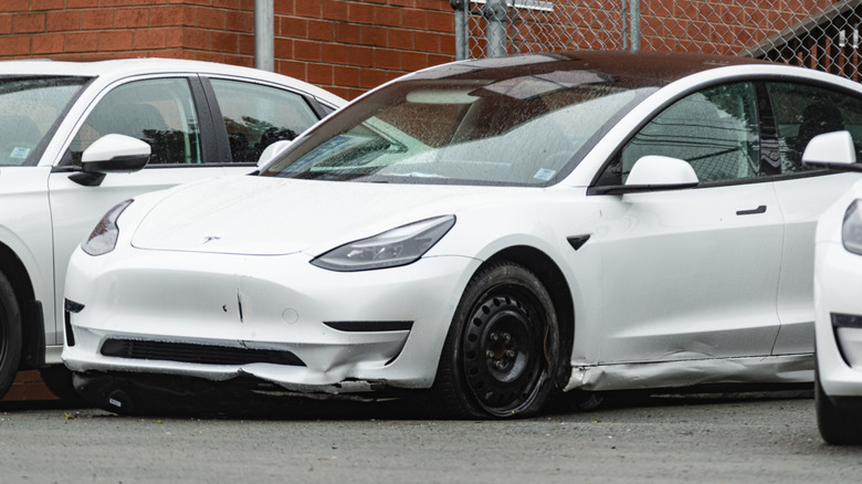 Damaged Tesla awaiting repair