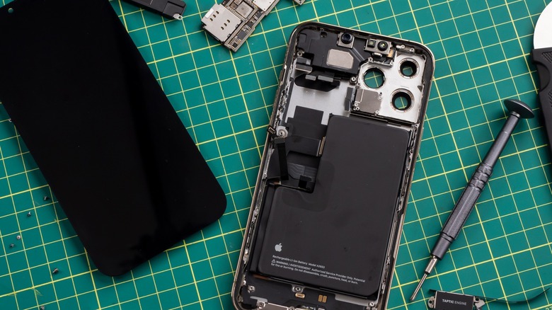 iPhone taken apart with hardware exposed