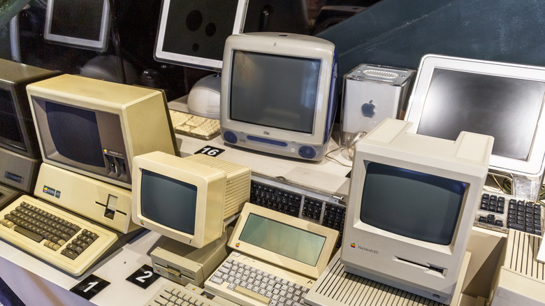 Row of mac computers of various generations