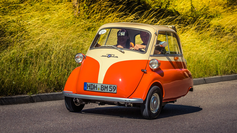 BMW Isetta 300 on the road with two passengers