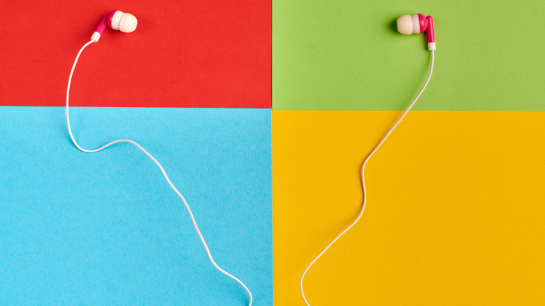 Wired earbuds colorful background